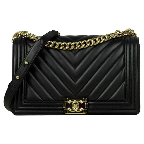 chanel medium sized boy bag in black with chevron lamskin|Chanel bag.